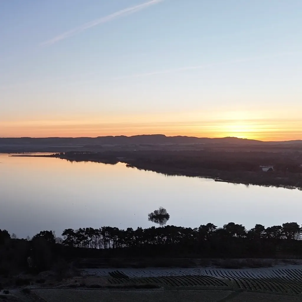 The loch at sunset, seen from above the house.